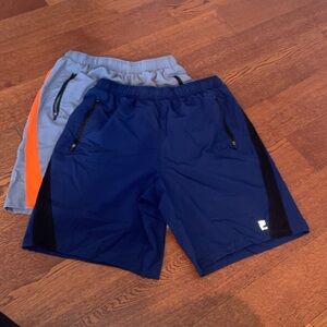 2 pairs of Fila athletic shorts